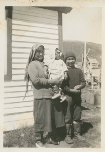 Image of Eskimo [Inuit] family (mother and two children)